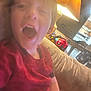 William joined the competition — help win amazing prizes! child, blurry, couch, indoor, lamp, toy, red_shirt, mouth_open, home, furniture, person, living_room, casual, relaxed, seated, expression, face, hair, comfortable, daylight