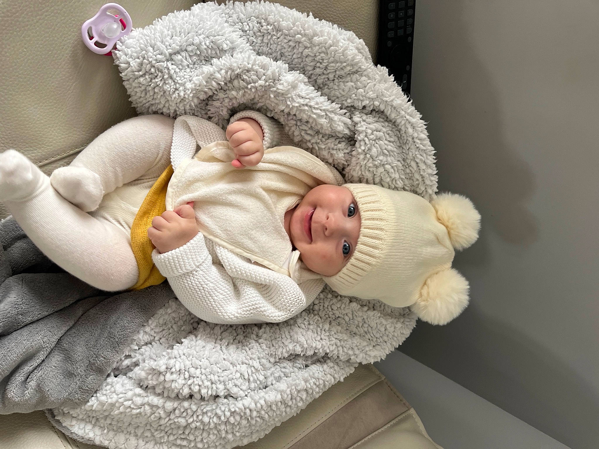 Mya participe au concours pour gagner de l'argent avec cette photo : baby, baby_products, baby_sleeping, baby_toddler_clothing, cheek, child, comfort, eye, face, fur, hand, hat, head, headwear, human_body, joy, knit_cap, linens, person, skin