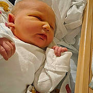 Matthew joined the competition — help win amazing prizes! newborn, baby, sleeping, blanket, crib, bed, bedding, infant, child, cozy, peaceful, soft, wrapped, clothing, person, indoor, cute, toddler, resting, portrait
