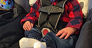 Matthew is registered to the contest to win money with this photo: baby, car_seat, infant, sleeping, plaid_shirt, white_socks, denim_pants, child, safety_harness, face, head_support, indoor, cute, peaceful, small_hands, newborn, fabric, pattern, resting, cozy