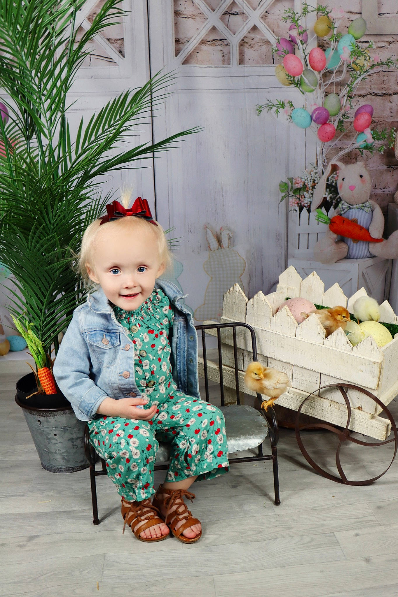 Ensley is registered to the contest to win money with this photo: baby, baby_products, baby_toddler_clothing, child, event, fashion_accessory, flooring, garden, grass, hat, joy, leaf, leisure, pattern, person, plant, sitting, smile, spring, toddler