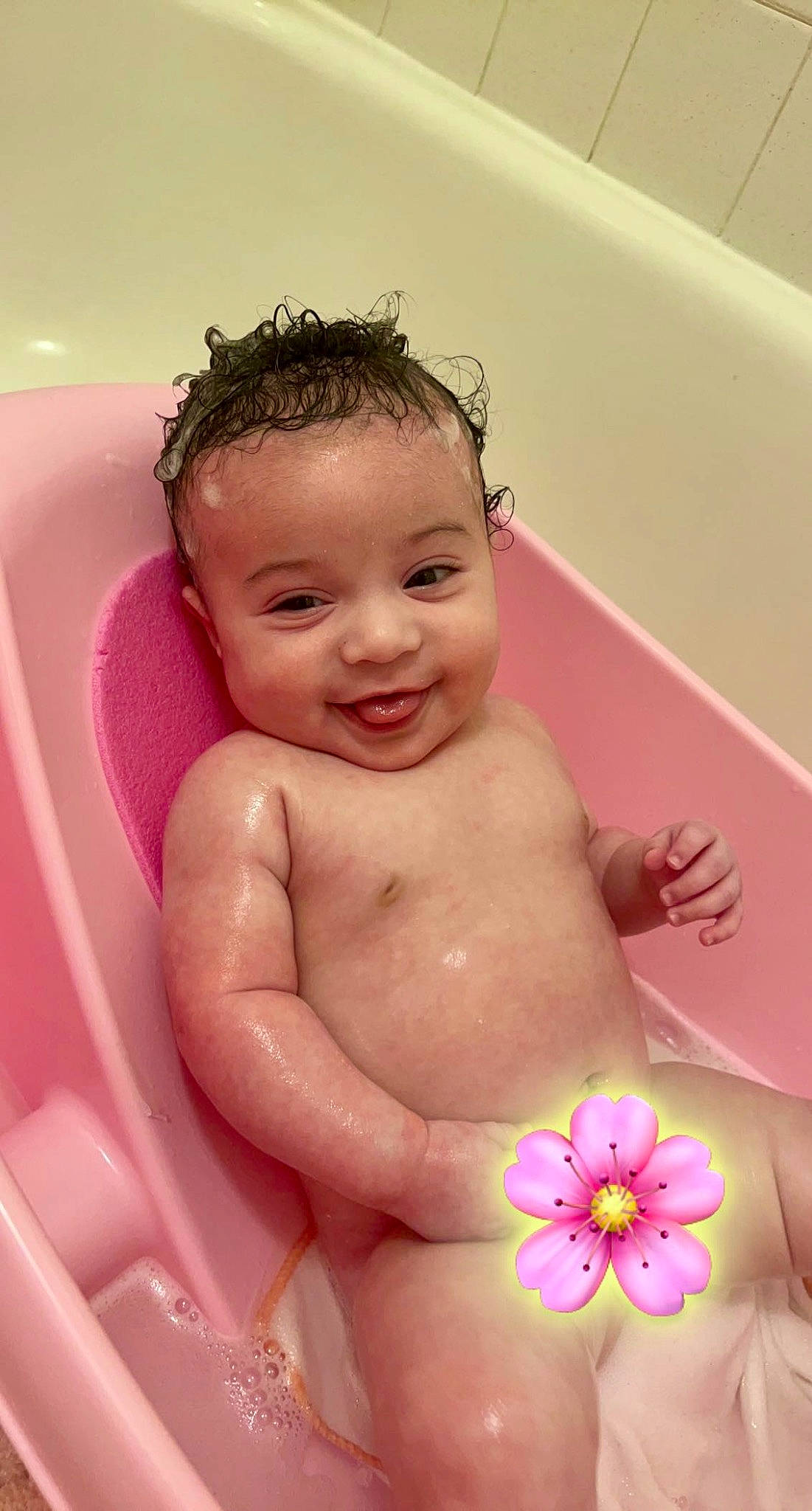 London joined the competition — help win amazing prizes! baby_bathing, bathing, bathroom, bathtub, cheek, child, facial_expression, finger, flower, hand, happy, head, joy, mouth, organ, person, pink, skin, smile, stomach