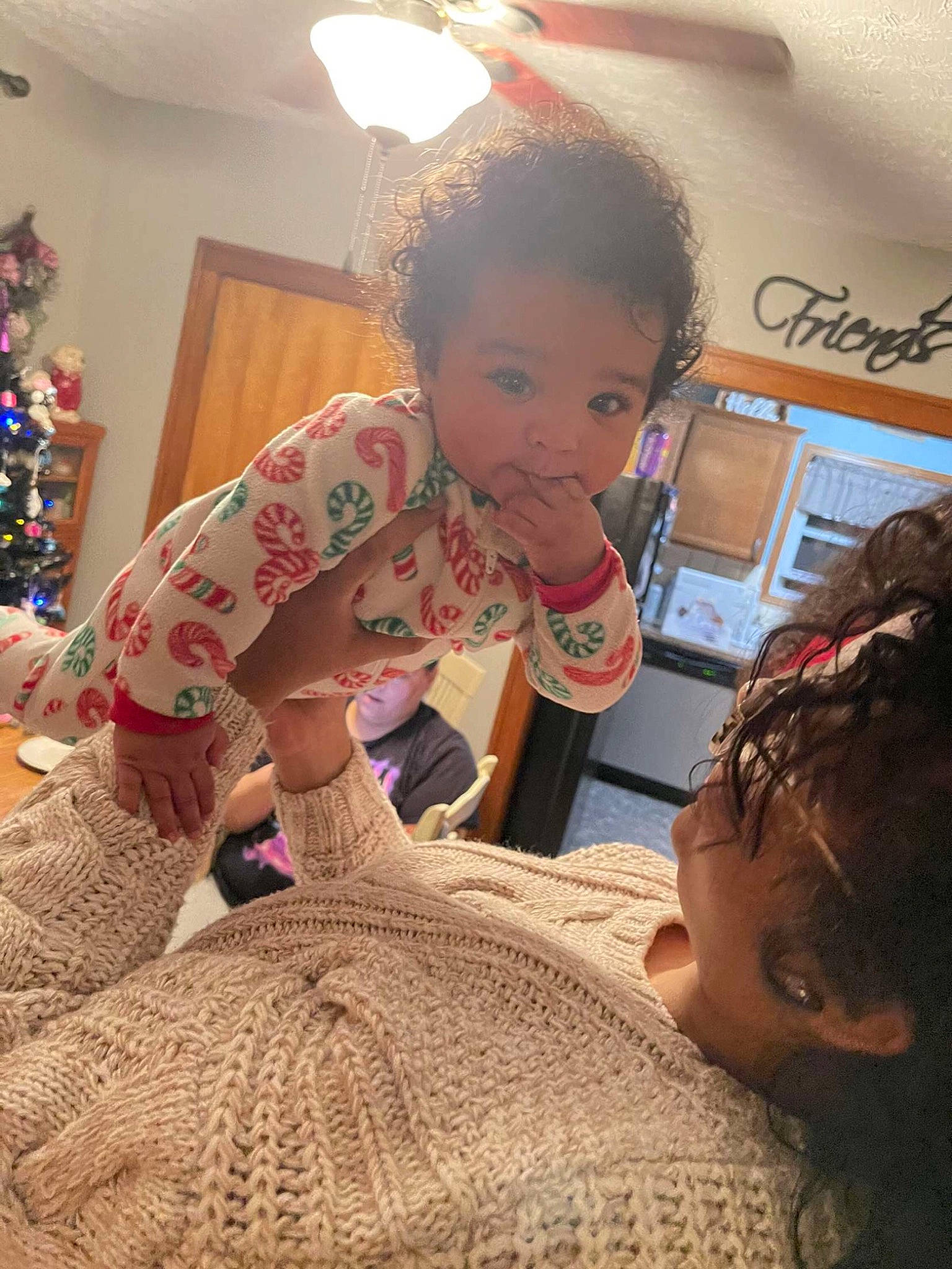 Liana is registered to the contest to win money with this photo: baby, child, christmas_ornament, christmas_tree, craft, event, flooring, fun, happy, holiday, holiday_ornament, leisure, linens, pattern, person, room, sitting, skin, t_shirt, toddler