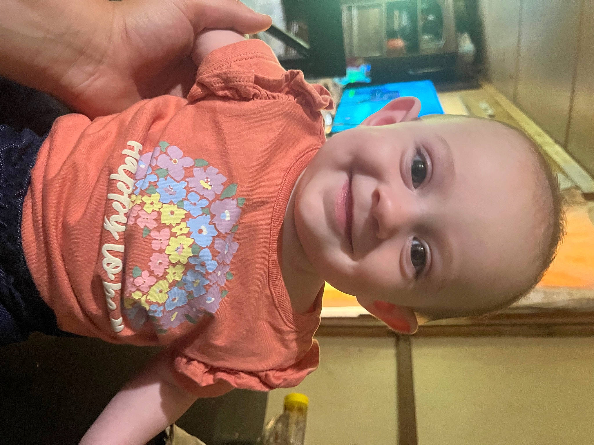 Esther is registered to the contest to win money with this photo: baby, baby_products, baby_toddler_clothing, cheek, child, eyelash, fashion_accessory, finger, fun, happy, joy, nail, nose, pattern, person, room, skin, sleeve, smile, thumb