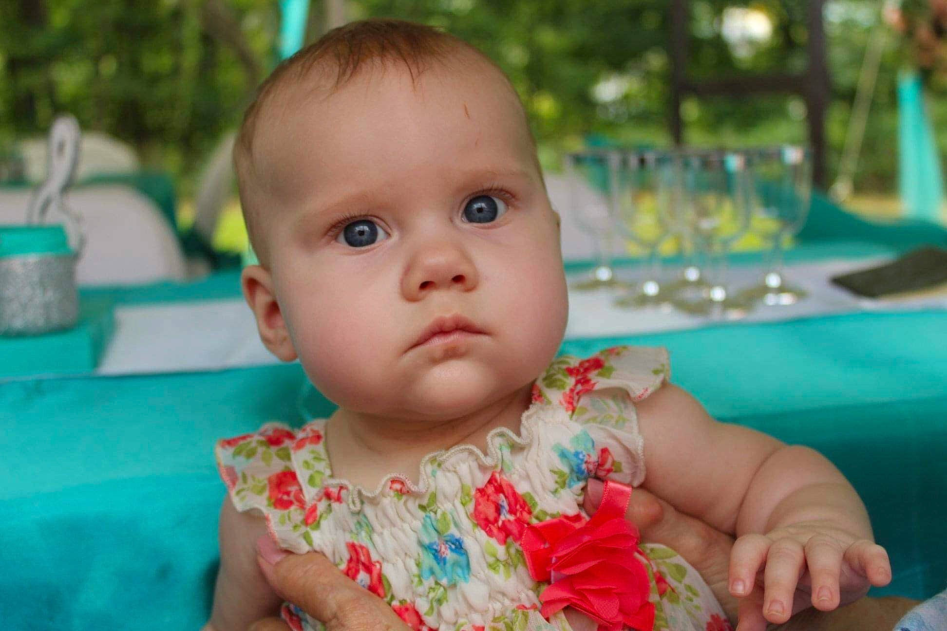 Gracelyn is registered to the contest to win money with this photo: baby, cheek, child, ear, eye, face, fun, head, iris, leisure, lip, nose, person, recreation, skin, smile, summer, toddler, vacation, water