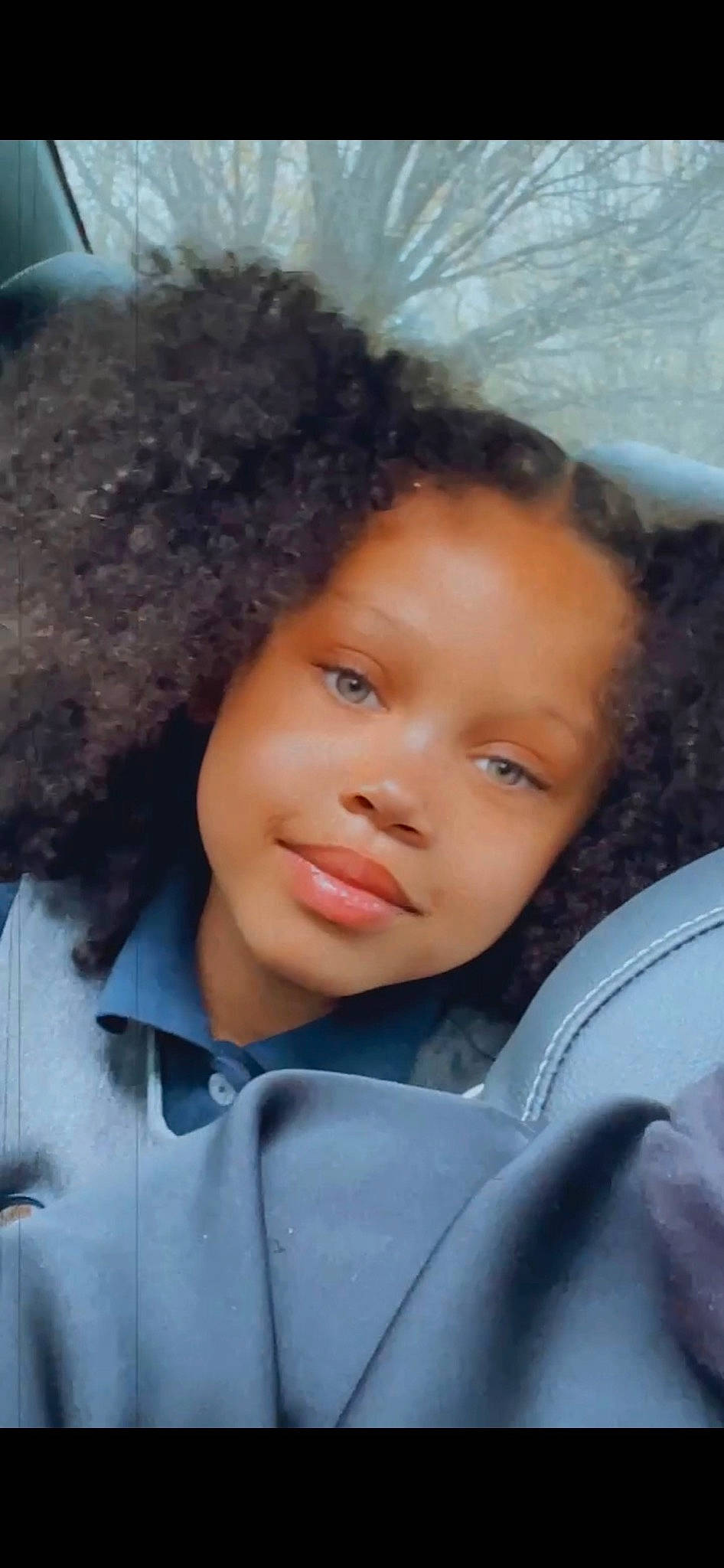 Egypt is registered to the contest to win money with this photo: afro, cheek, chin, eye, eyebrow, face, flash_photography, forehead, hair, hairstyle, happy, head, human, jheri_curl, lip, nose, outerwear, person, skin, smile