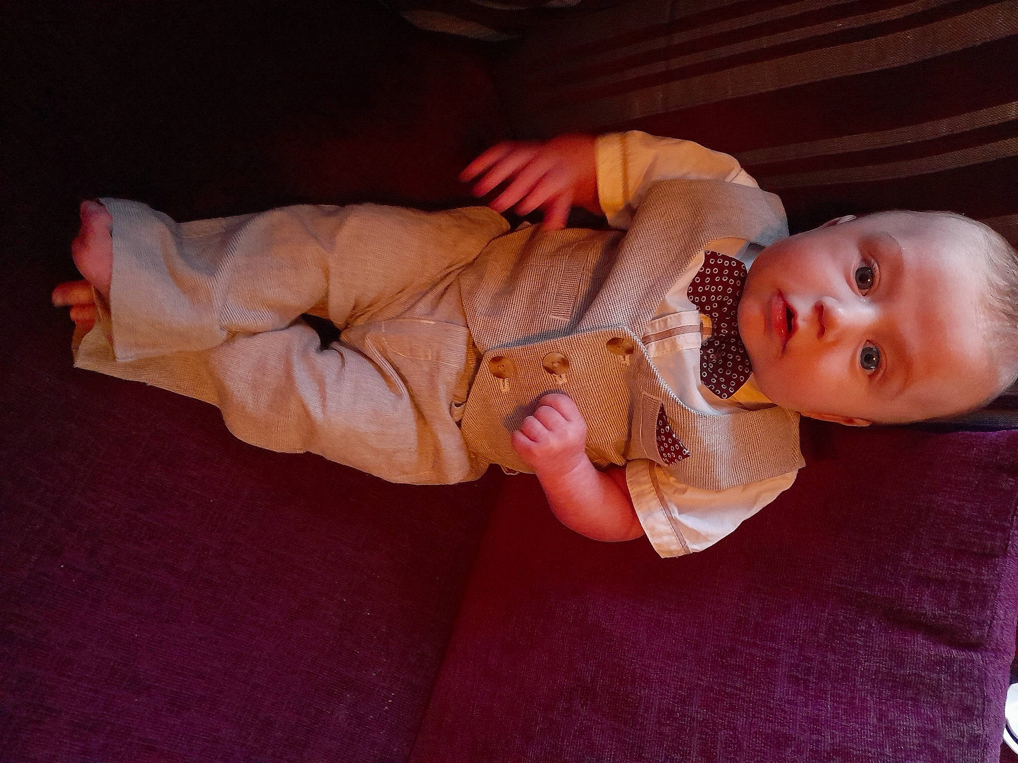 George is registered to the contest to win money with this photo: abdomen, baby, baby_products, baby_toddler_clothing, cheek, child, comfort, elbow, eye, human_leg, leg, mouth, nail, person, sitting, skin, sleeve, surprise, thigh, toddler