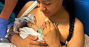 Sarah is registered to the contest to win money with this photo: baby, birth, blanket, blue_chair, braid, caregiver, family, hands, hospital, hospital_bed, indoors, infant, iv_line, medical_equipment, mother, newborn, parent, portrait, postpartum, swaddled_baby