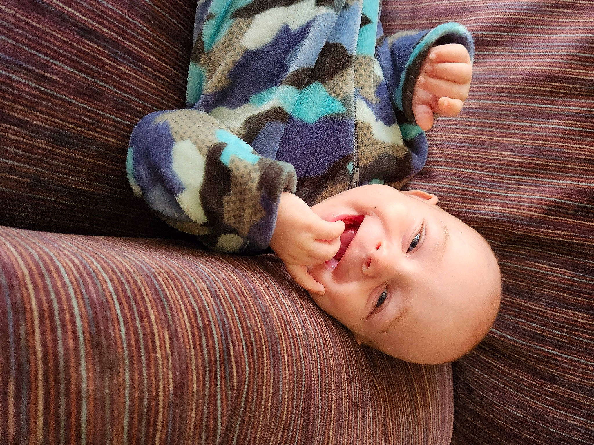 Colton joined the competition — help win amazing prizes! child, comfort, finger, flooring, gesture, grass, happy, hardwood, human_leg, linens, nose, pattern, person, skin, sleeve, smile, textile, toddler, vertebrate, wood