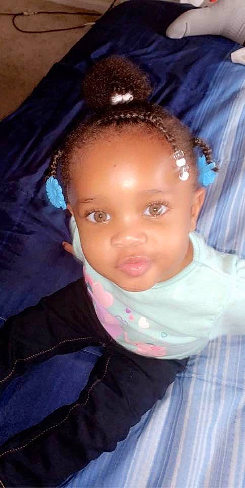 Kaeli is registered to the contest to win money with this photo: baby, black_hair, cheek, child, ear, eye, eyebrow, face, forehead, hair, hair_accessory, hairstyle, head, iris, lip, neck, nose, person, skin, smile