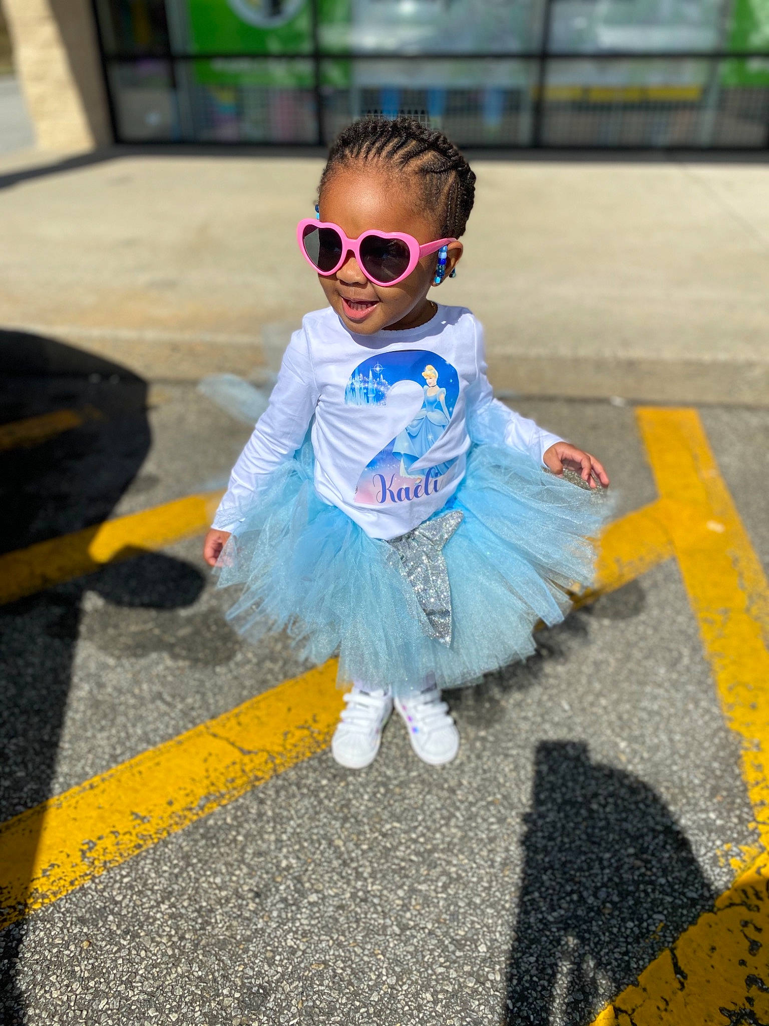 Kaeli is registered to the contest to win money with this photo: child, cool, costume, eyewear, fun, glasses, outerwear, person, personal_protective_equipment, play, smile, sunglasses, toddler, yellow