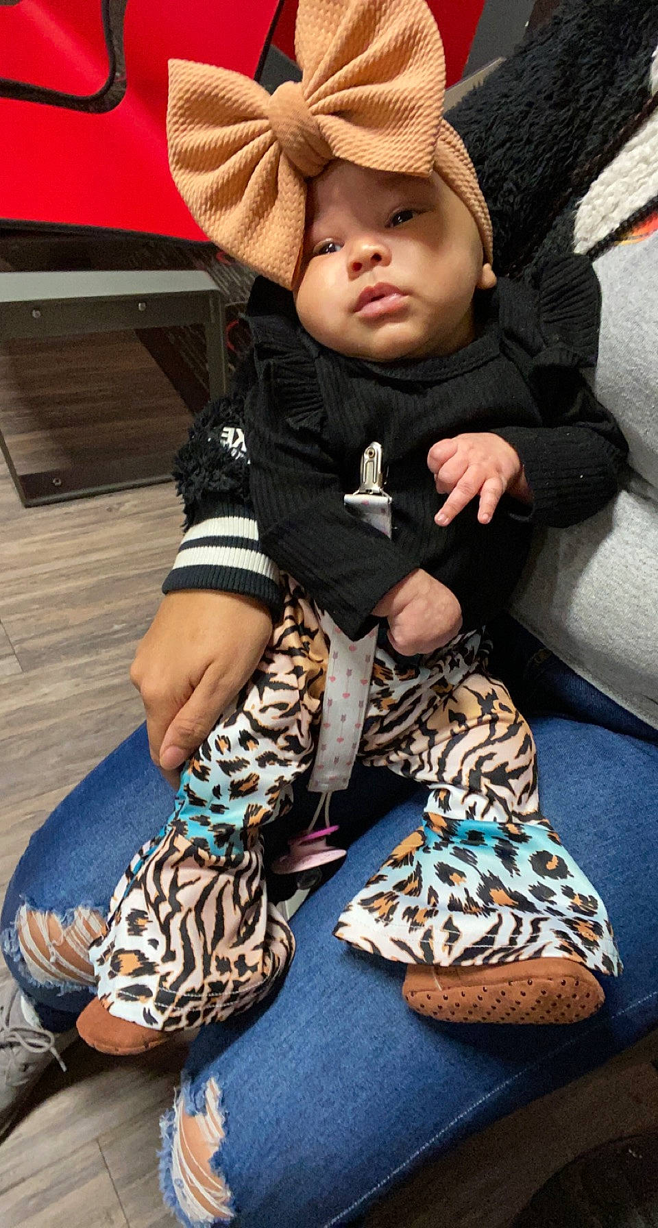 Mylah joined the competition — help win amazing prizes! baby, baby_toddler_clothing, cap, child, comfort, cool, fashion_accessory, foot, green, headwear, human_leg, knee, lap, leg, linens, pattern, person, sleeve, sock, t_shirt