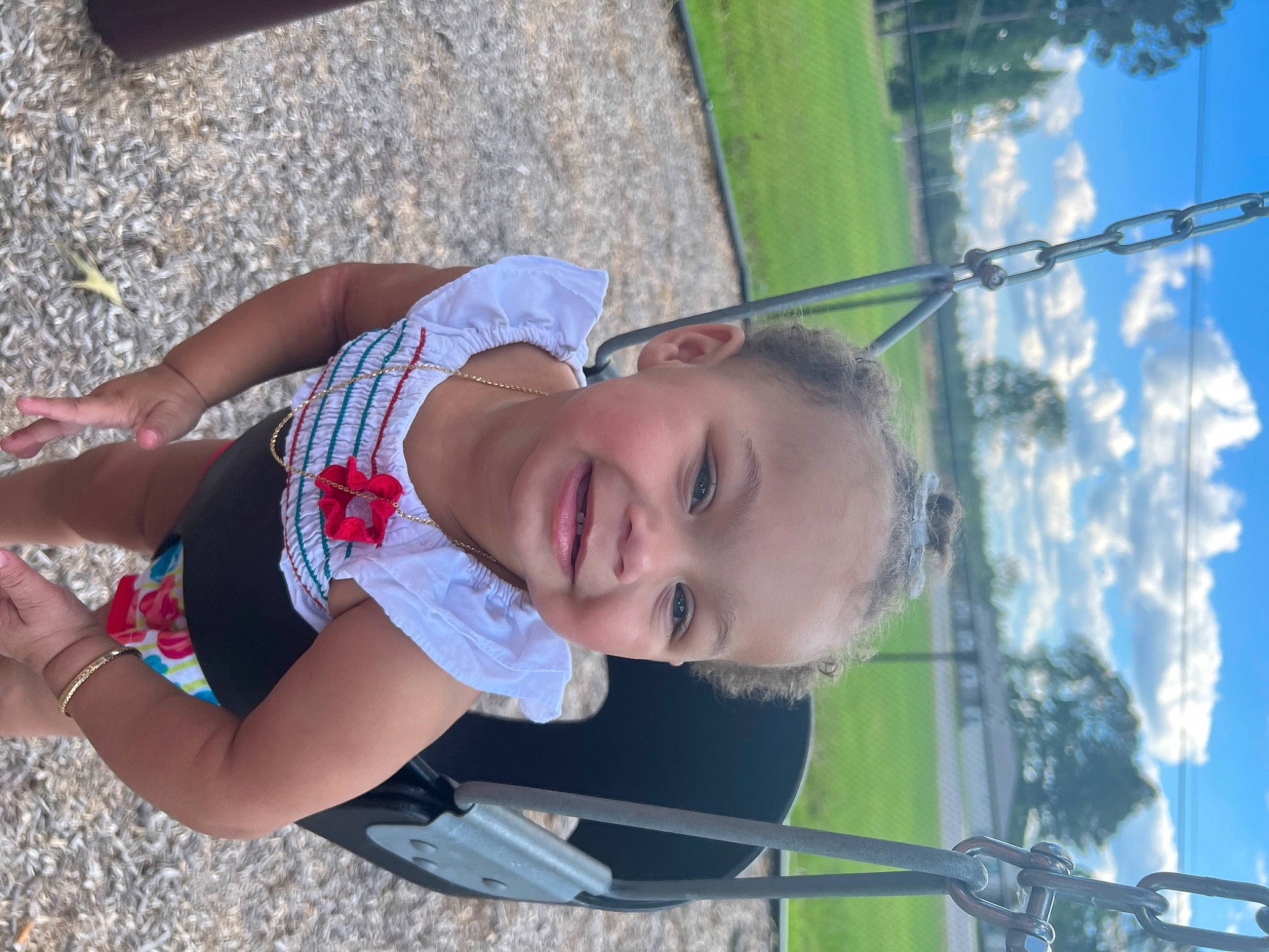 Rylyn is registered to the contest to win money with this photo: cloud, elbow, electric_blue, fun, grass, green, happy, human_leg, joy, leaf, leisure, people_in_nature, person, plant, recreation, skin, sky, smile, thigh, toddler