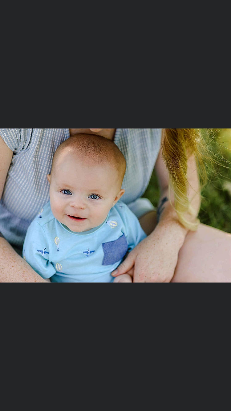 Luca joined the competition — help win amazing prizes! baby, baby_products, baby_toddler_clothing, cheek, child, finger, flash_photography, fun, gesture, grass, happy, iris, person, photo_caption, portrait, portrait_photography, sitting, sleeve, smile, t_shirt