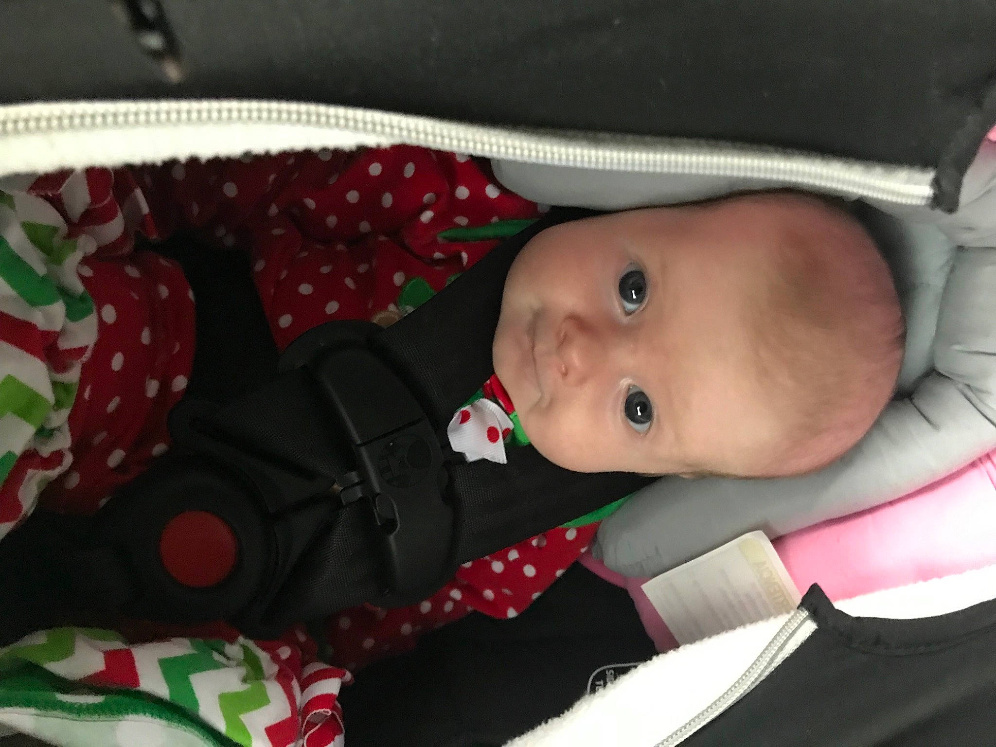 Raelynn is registered to the contest to win money with this photo: baby, baby_products, baby_toddler_clothing, cheek, comfort, dress, eye, face, facial_expression, head, human_body, lip, mammal, nose, person, product, skin, sleeve, textile, toddler