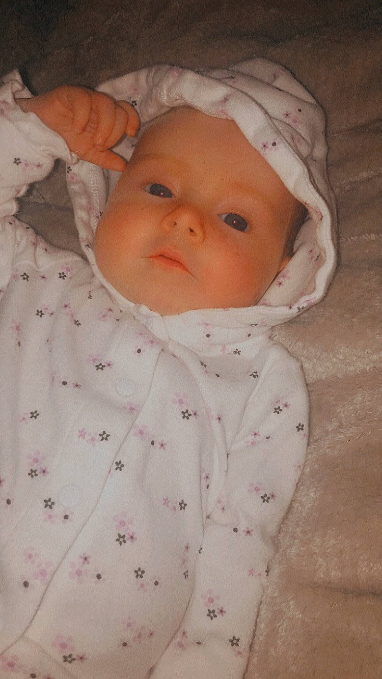 Raelynn joined the competition — help win amazing prizes! baby, baby_toddler_clothing, beauty, cheek, child, collar, comfort, eye, eyebrow, face, hat, headwear, iris, linens, lip, nose, pattern, person, pink, skin