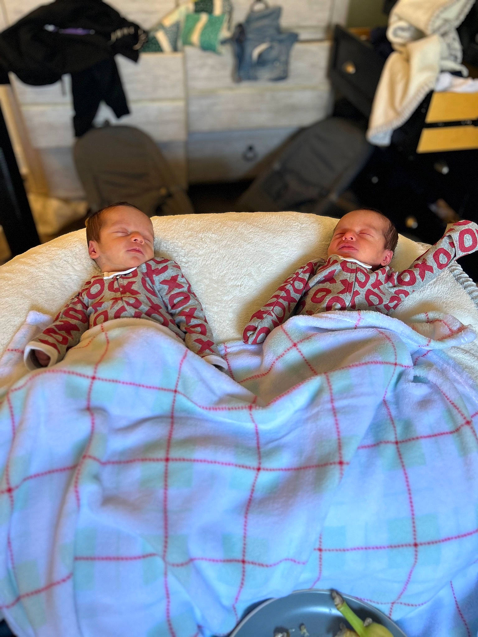 Rhett is registered to the contest to win money with this photo: bed_sheet, bedding, blanket, child, comfort, couch, event, flesh, human_leg, leisure, linens, nap, pattern, person, pillow, plaid, room, sitting, sleep, thigh