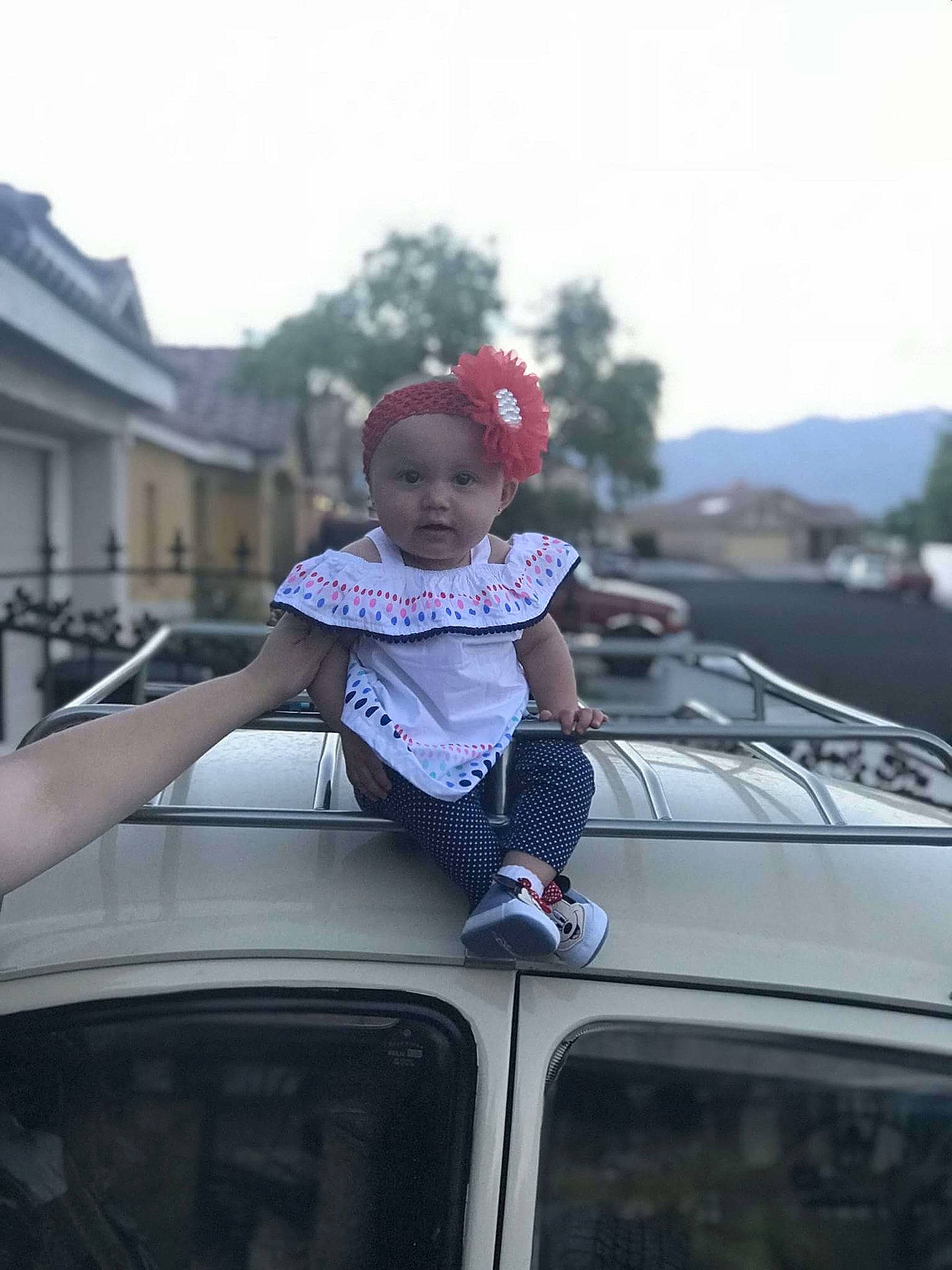 Julie joined the competition — help win amazing prizes! car, child, cool, day, family_car, fun, girl, headgear, land_vehicle, person, vacation, vehicle