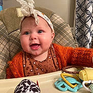 Gretchen joined the competition — help win amazing prizes! architecture, baby, bodypart, building, cap, clothing, couch, cushion, face, furniture, hat, head, homedecor, indoors, livingroom, person, photography, portrait, room, toy