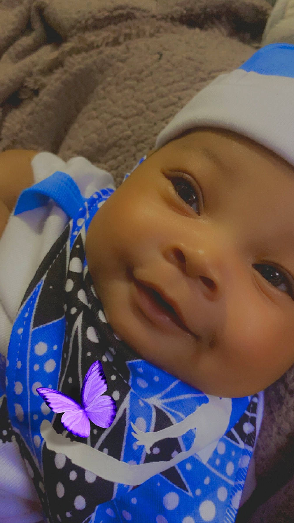 Valerie Unique joined the competition — help win amazing prizes! baby, blue, cheek, child, close_up, electric_blue, eyebrow, fashion_accessory, fun, happy, hat, headwear, iris, lip, nose, pattern, person, product, skin, smile