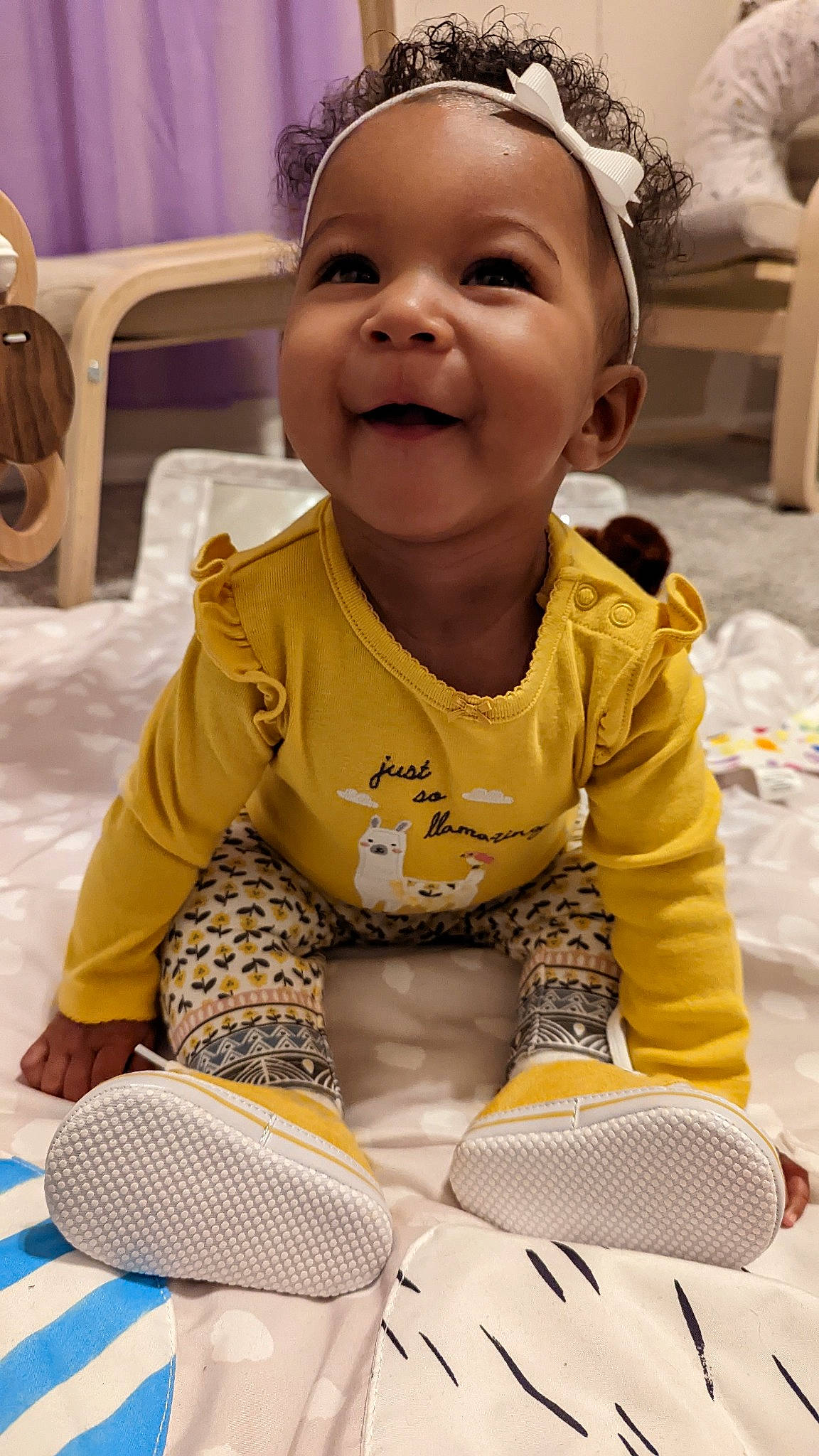 Jurnee is registered to the contest to win money with this photo: baby, baby_toddler_clothing, beauty, cheek, child, facial_expression, flooring, fun, hairstyle, happy, leisure, organ, people, person, photograph, skin, smile, snapshot, thigh, toddler