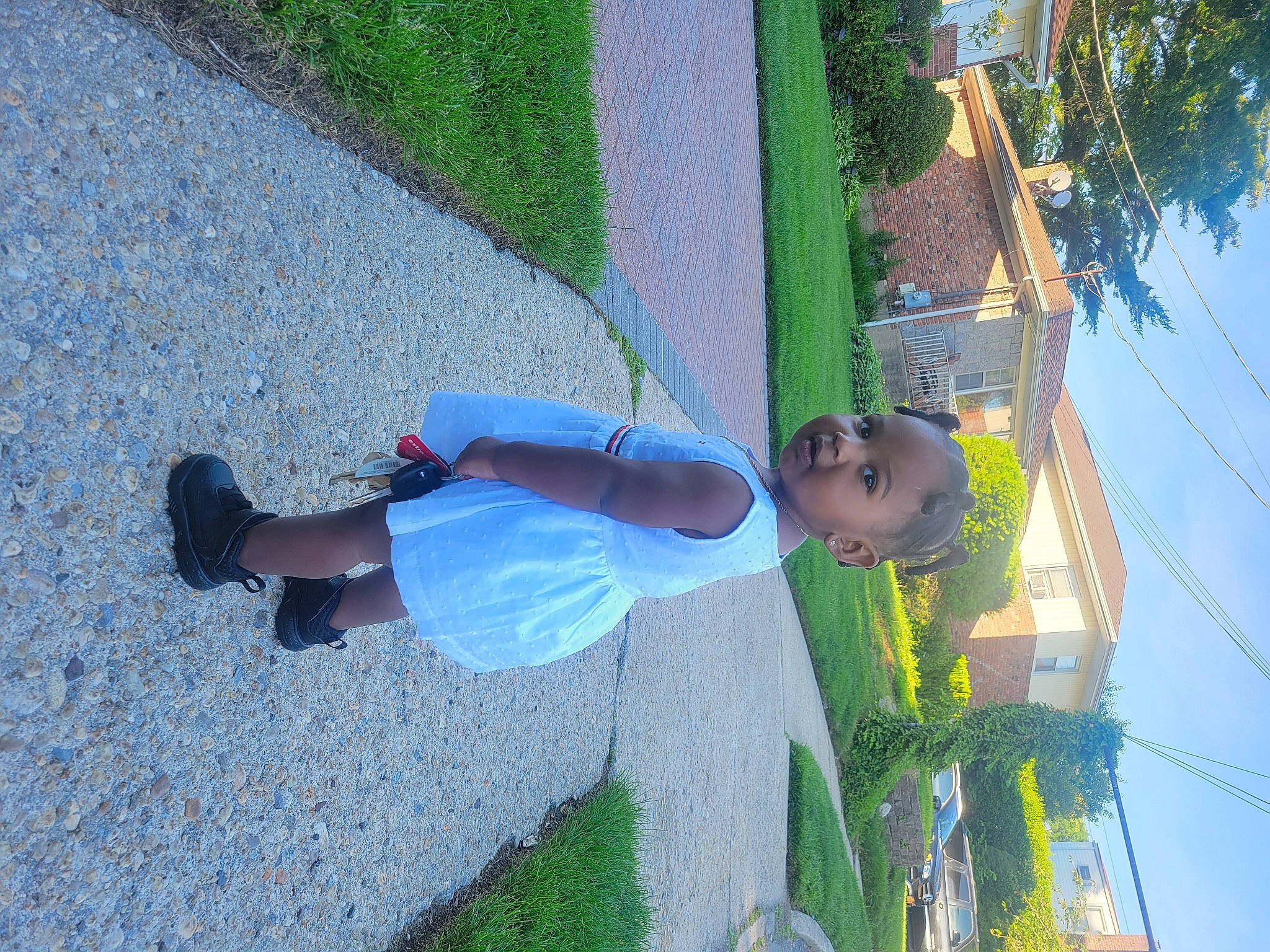 Aubrey joined the competition — help win amazing prizes! asphalt, azure, electric_blue, fun, grass, human_leg, leisure, people_in_nature, person, plant, recreation, road_surface, shadow, sidewalk, sky, t_shirt, toddler, tree, walking_shoe