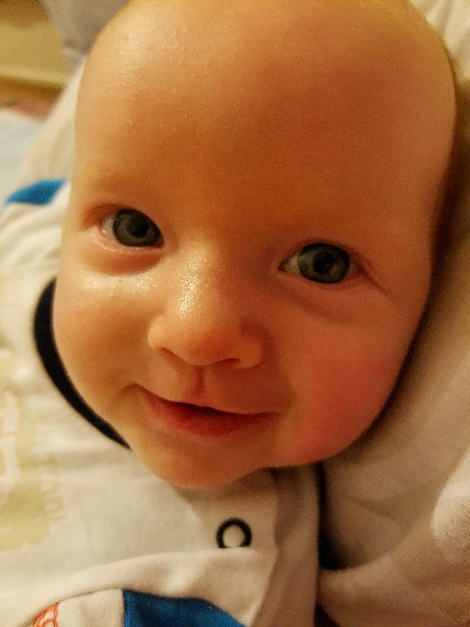 Aleksander is registered to the contest to win money with this photo: baby, baby_making_funny_faces, cheek, child, chin, close_up, ear, eye, eyebrow, face, facial_expression, forehead, head, iris, lip, mouth, nose, person, skin, smile