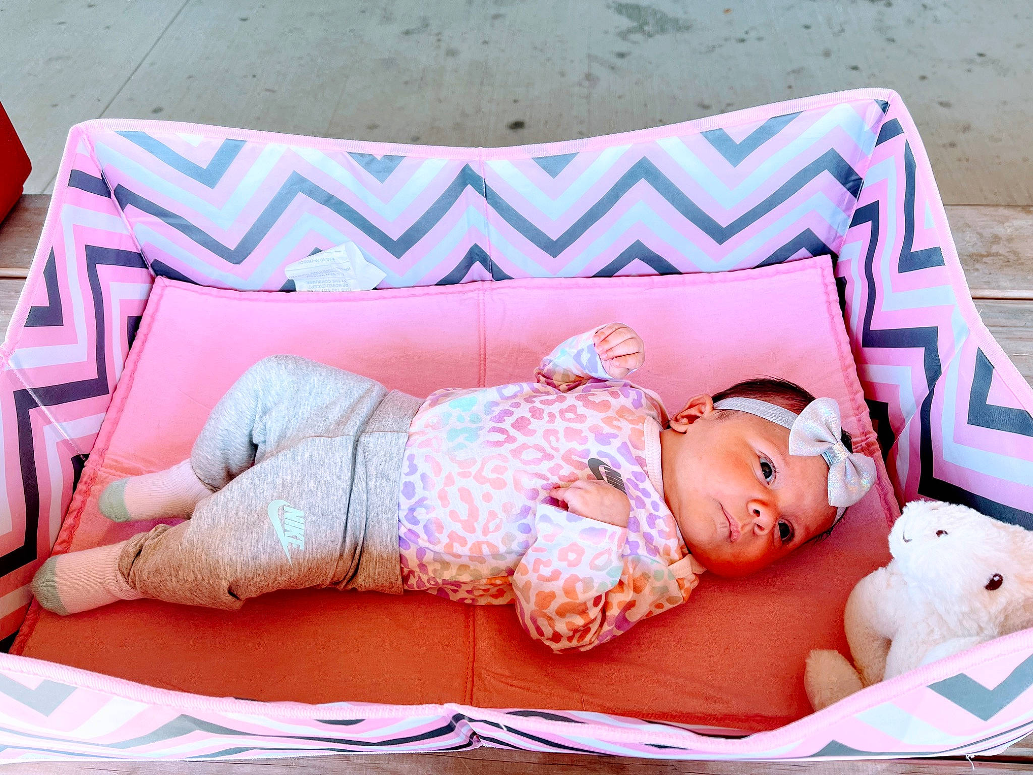Amaya is registered to the contest to win money with this photo: baby, baby_sleeping, baby_toddler_clothing, bedding, bedtime, child, comfort, couch, hat, headwear, leisure, linens, magenta, pattern, person, pink, purple, rectangle, sitting, textile