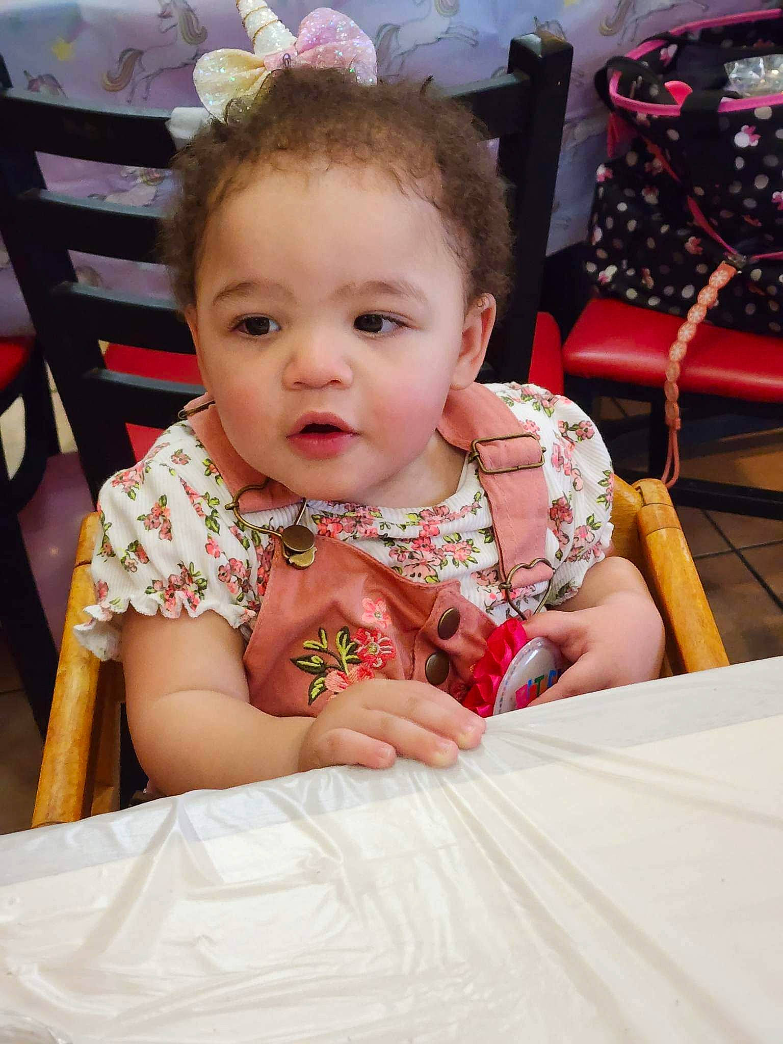 Della joined the competition — help win amazing prizes! baby, baby_toddler_clothing, chair, cheek, child, dress, event, fun, happy, head, iris, jewellery, pattern, peach, person, pink, sitting, skin, textile, toddler