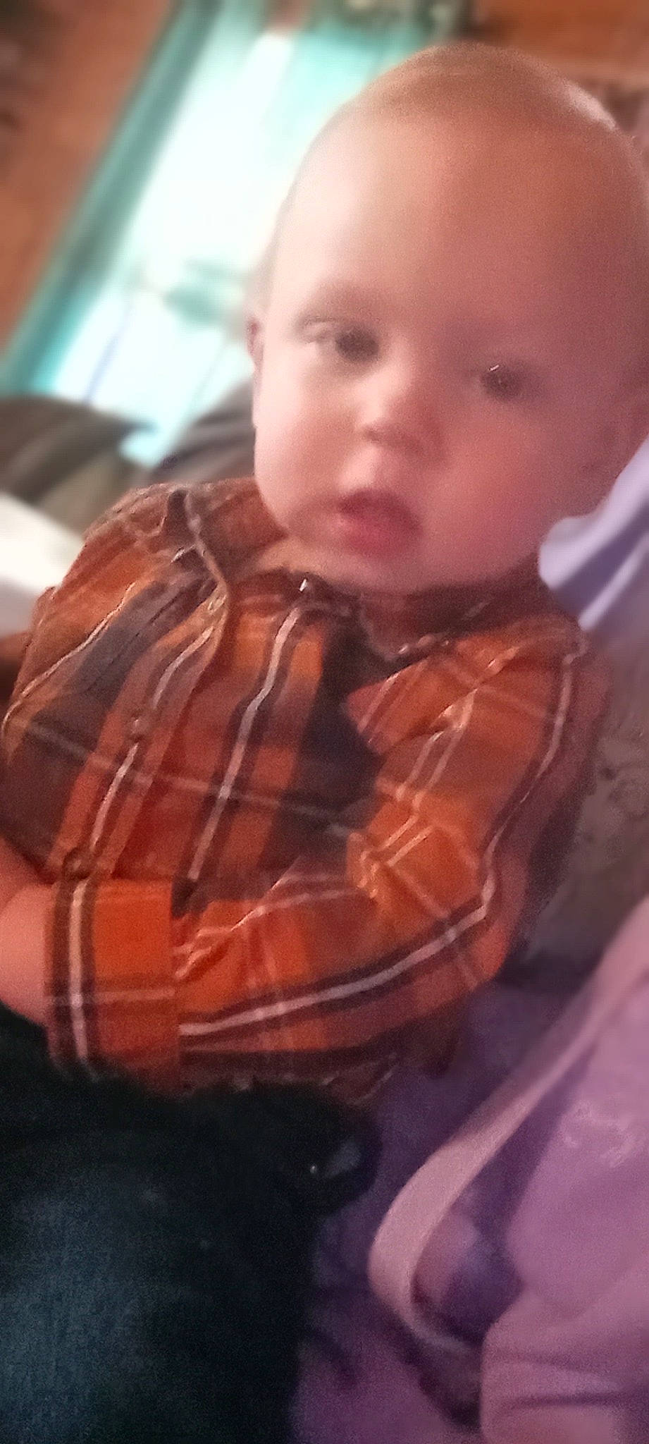 Klayton is registered to the contest to win money with this photo: baby, baby_toddler_clothing, beard, cheek, collar, comfort, ear, eyelash, facial_hair, human_body, iris, lip, neck, nose, pattern, person, plaid, sitting, sleeve, tartan