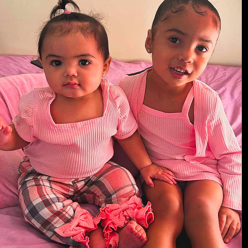 Faith And Vidalina joined the competition — help win amazing prizes! bed, bedroom, bodypart, child, clothing, couch, face, female, finger, furniture, girl, hand, head, indoors, pajamas, people, person, photography, portrait, shorts
