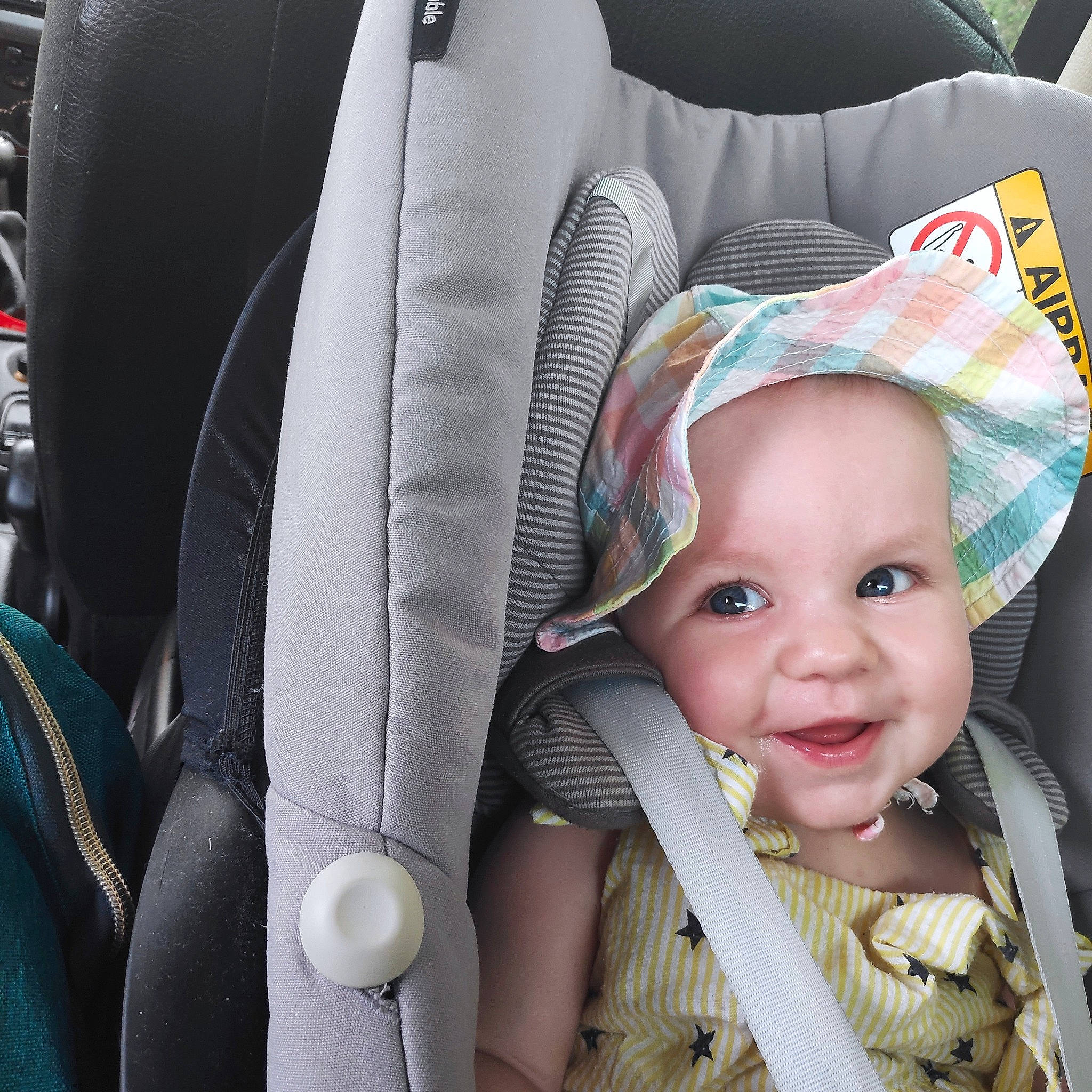 Hanna is registered to the contest to win money with this photo: baby, baby_carriage, baby_in_car_seat, baby_products, baby_safety, baby_sleeping, baby_toddler_clothing, cap, car_seat, car_seat_cover, child, comfort, costume_hat, happy, human_body, person, product, seat_belt, smile, toddler