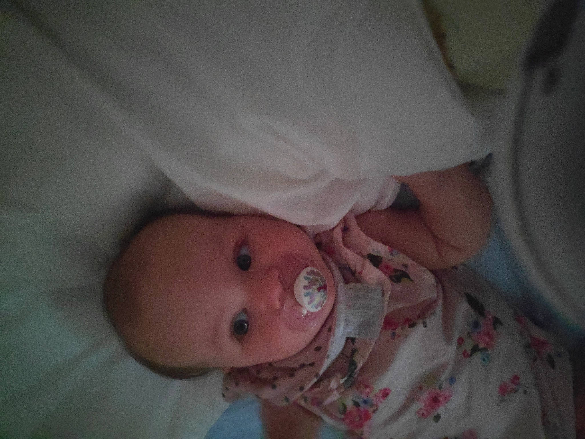 Hanna is registered to the contest to win money with this photo: arm, baby, baby_products, baby_safety, baby_toddler_clothing, cheek, chest, child, comfort, elbow, eye, hand, human_body, linens, lip, nose, person, room, skin, sleeve