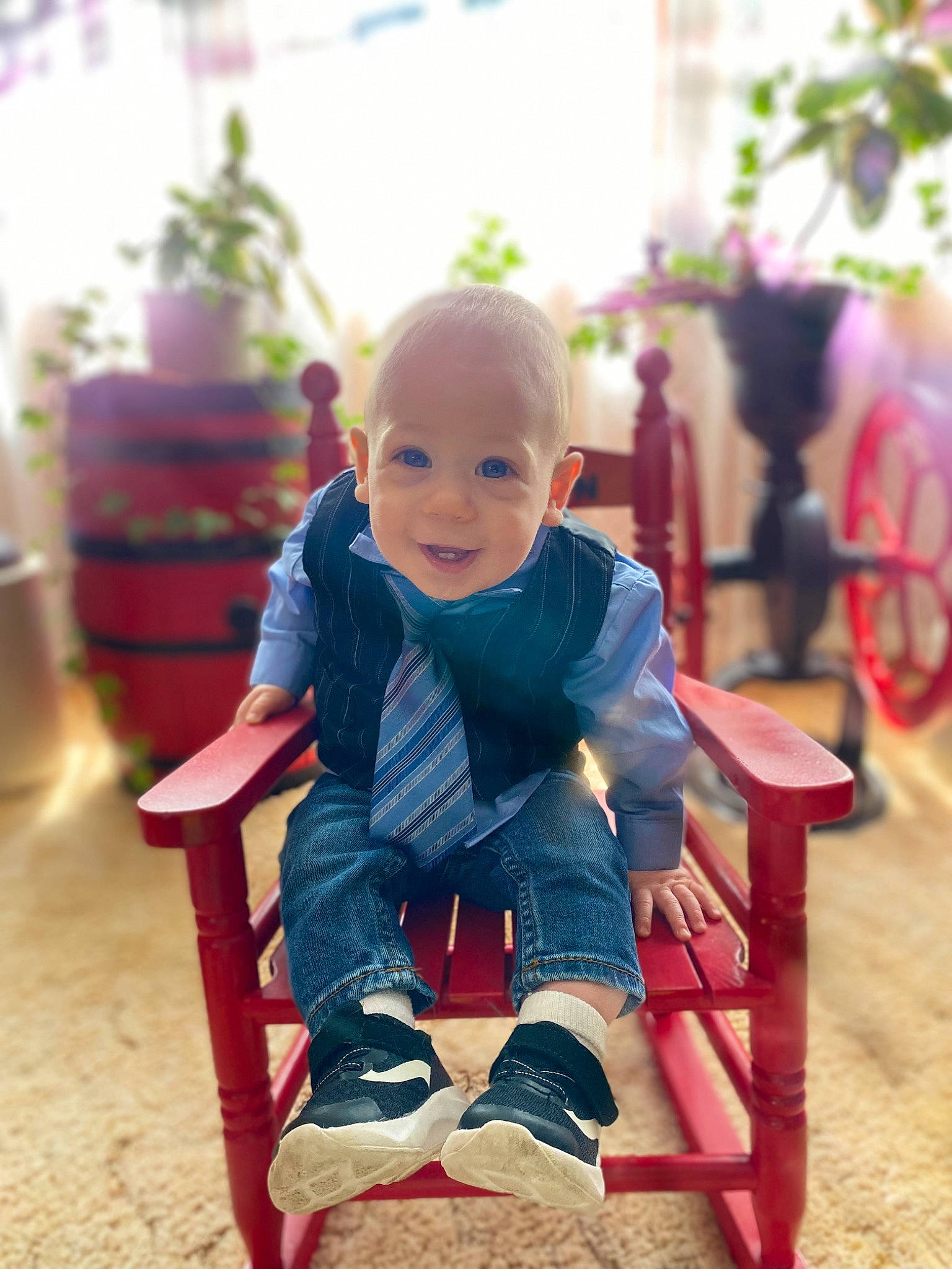 Jaxton is registered to the contest to win money with this photo: baby, baby_toddler_clothing, beauty, chair, child, flooring, fun, happy, houseplant, human, leisure, person, plant, product, sitting, sleeve, smile, standing, t_shirt, toddler
