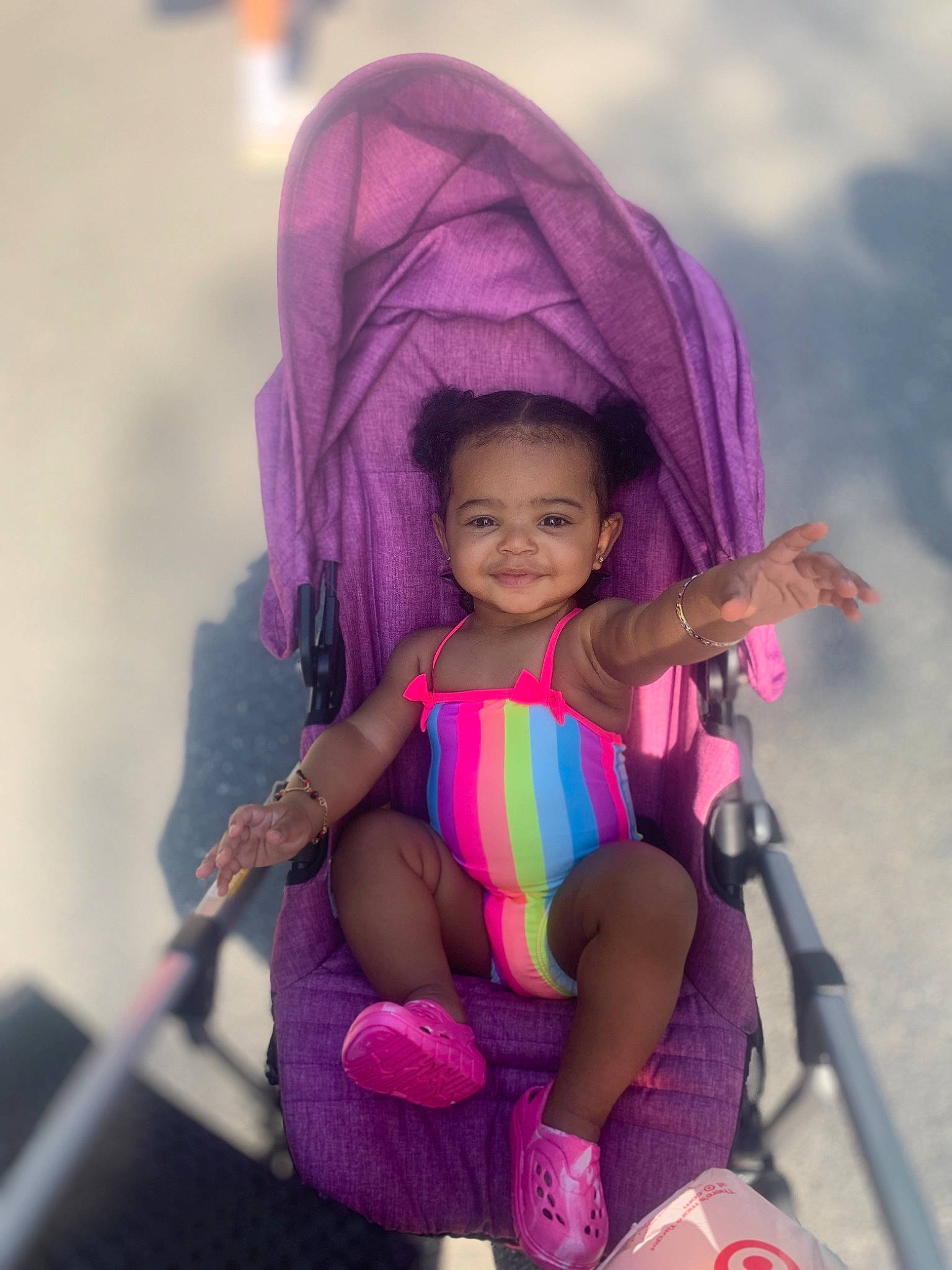 Avaya is registered to the contest to win money with this photo: baby, baby_carriage, baby_products, child, face, fun, joy, magenta, people, person, pink, plant, product, purple, skin, smile, toddler, vacation, violet