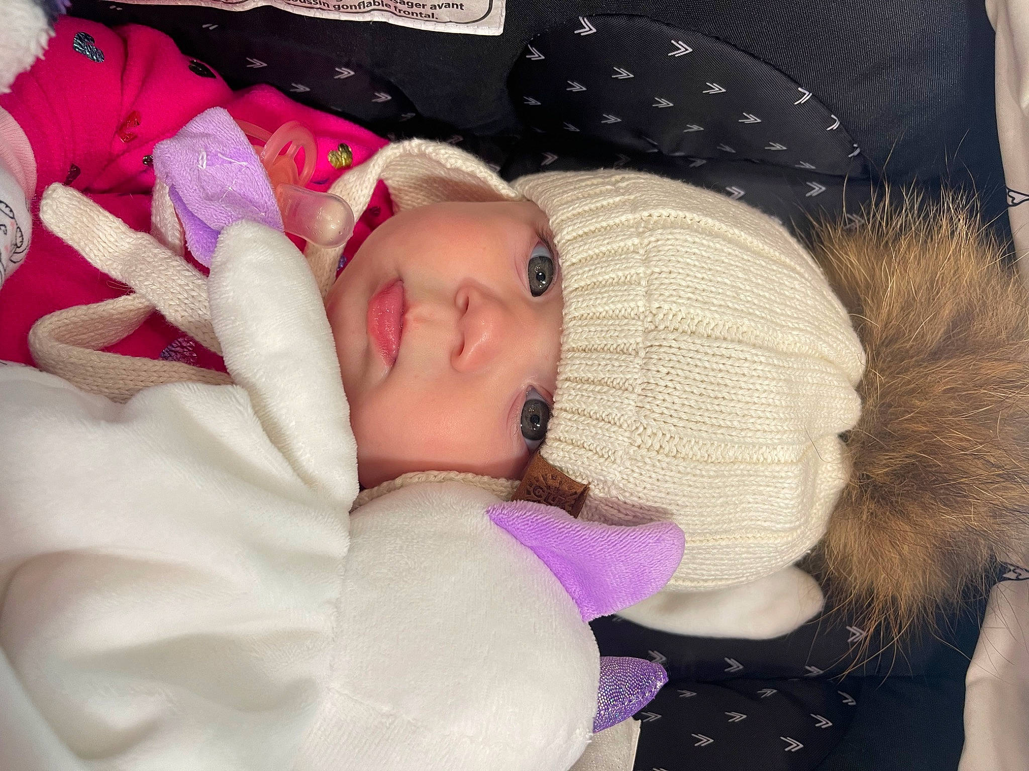 Lyannah a rejoint le concours — aidez-le/la à gagner de superbes lots ! arm, baby, baby_products, baby_toddler_clothing, cheek, child, comfort, eye, eyebrow, eyelash, fur, headwear, lip, magenta, nap, pattern, person, pink, purple, skin
