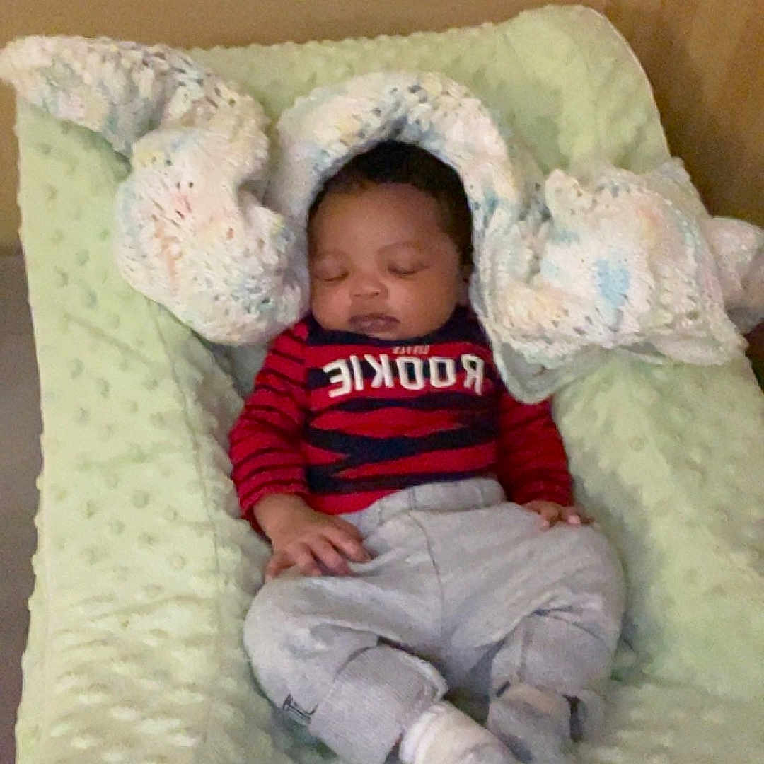 Mion joined the competition — help win amazing prizes! apparel, baby, blanket, child, clothing, comfort, cozy, cushion, cute, face, head, indoor, infant, peaceful, person, relaxation, resting, sleeping, small, soft