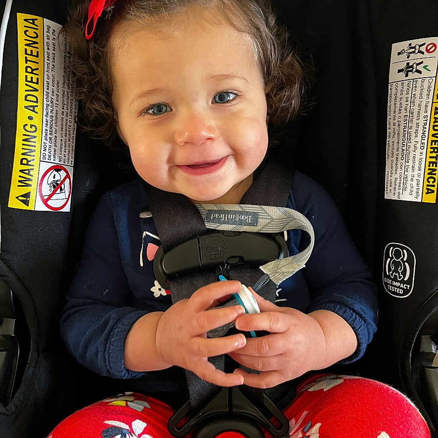 Jilliann joined the competition — help win amazing prizes! baby, bodypart, car, car_interior, carseat, couch, cushion, electronics, face, finger, furniture, hand, head, homedecor, person, phone, photography, portrait, transportation, vehicle