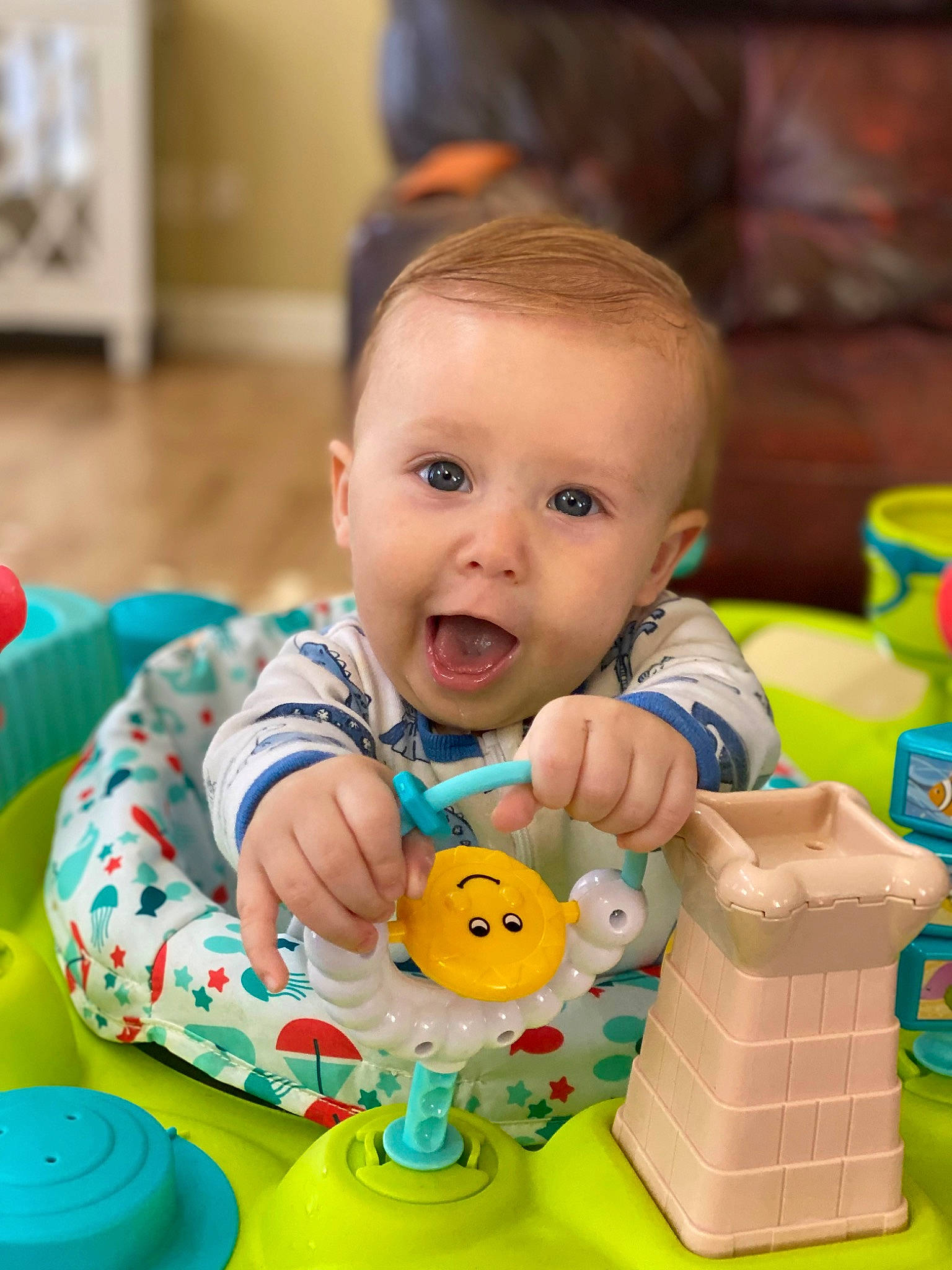 Somasundara is registered to the contest to win money with this photo: baby, baby_playing_with_toys, baby_products, baby_toys, cheek, child, event, fun, happy, person, picture_frame, plastic, play, room, sitting, smile, surprise, toddler, toy, toy_block