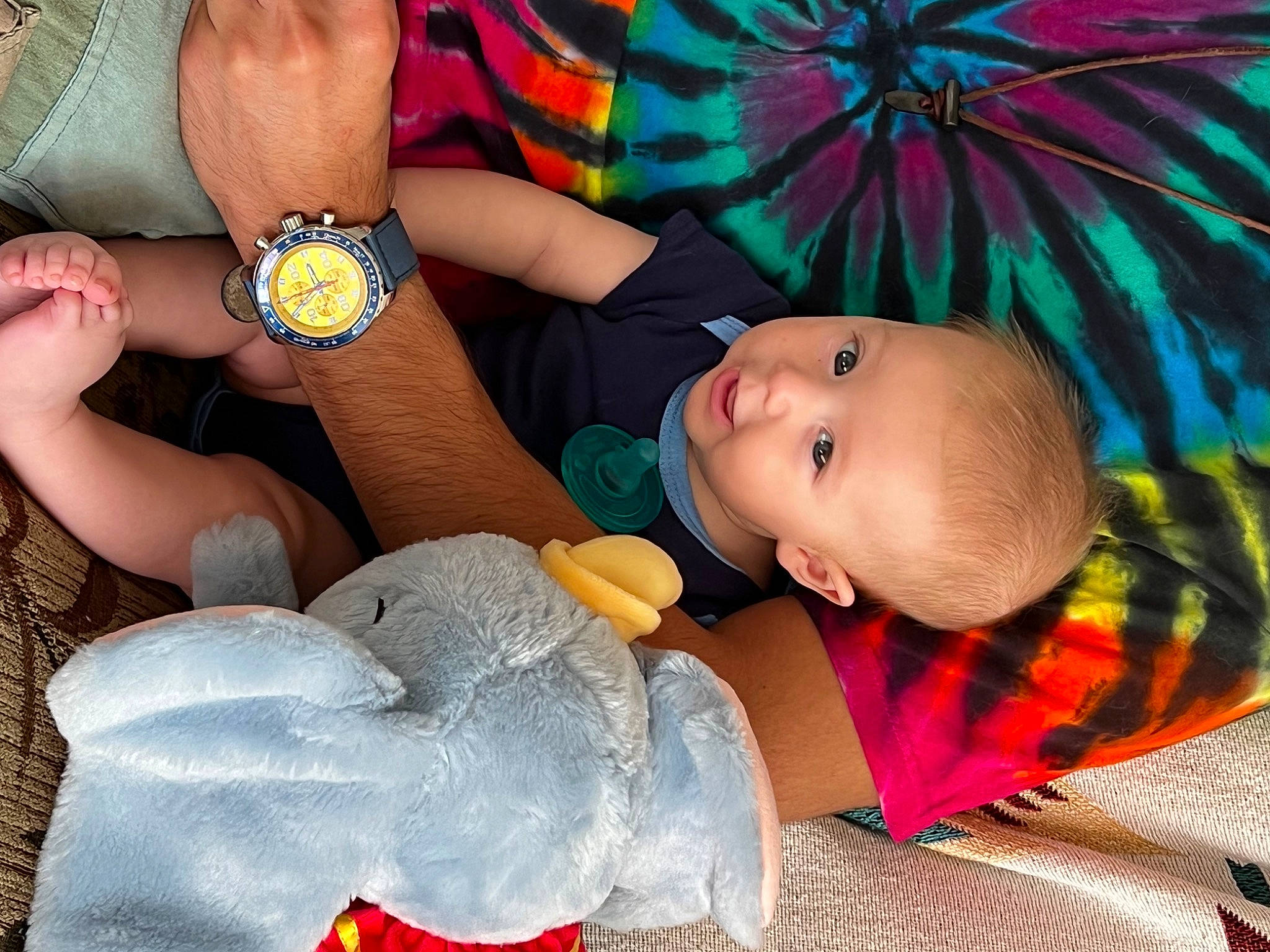 Somasundara joined the competition — help win amazing prizes! analog_watch, baby, baby_toddler_clothing, child, clock, comfort, finger, fun, gesture, happy, iris, lap, nail, pattern, person, skin, textile, toddler, umbrella, watch