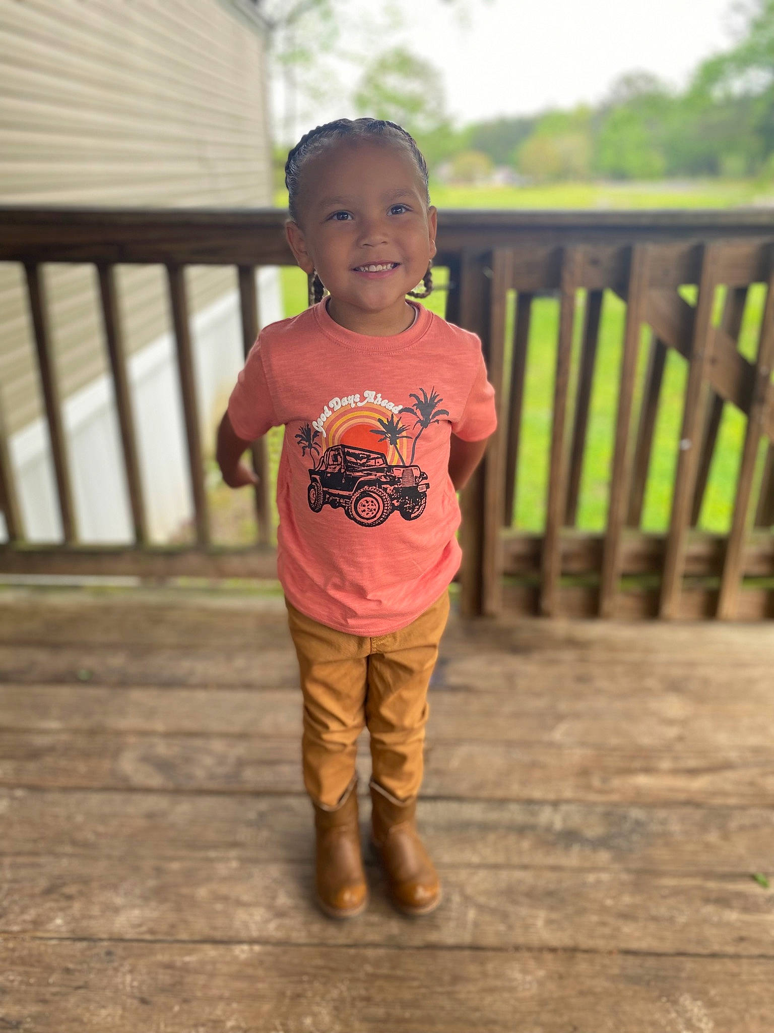 Brentlee is registered to the contest to win money with this photo: baby_toddler_clothing, child, face, flooring, fun, grass, happy, head, joy, leisure, magenta, person, recreation, skin, sky, sleeve, smile, standing, t_shirt, toddler