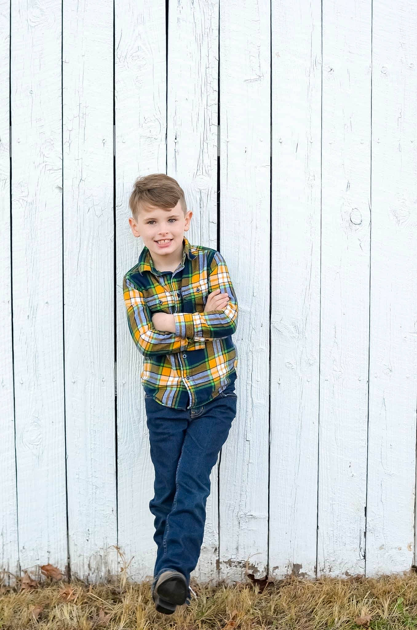 Kooper is registered to the contest to win money with this photo: child, denim, flash_photography, grass, grey, hair, happy, human_body, jacket, joy, people_in_nature, person, plaid, shirt, sleeve, smile, street_fashion, t_shirt, tartan, toddler