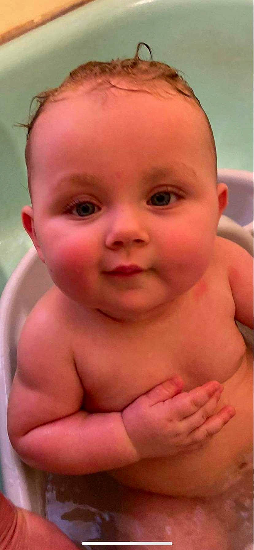 Madeline is registered to the contest to win money with this photo: arm, baby_bathing, cheek, chin, eye, eyebrow, eyelash, face, facial_expression, forehead, hair, hairstyle, head, human_body, lip, mouth, neck, nose, organ, person
