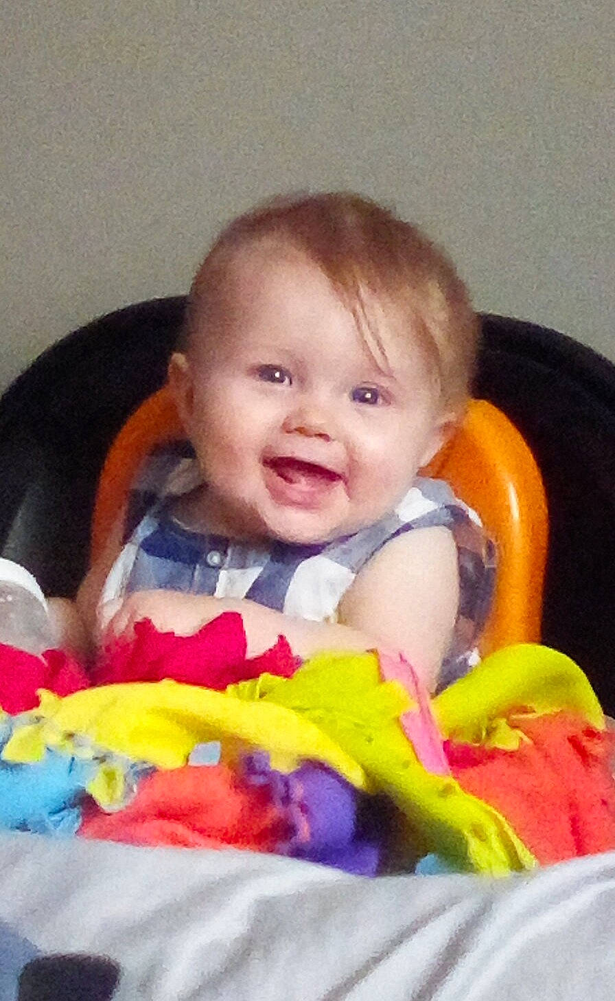 Gracie joined the competition — help win amazing prizes! baby, baby_playing_with_toys, baby_products, baby_toddler_clothing, cheek, child, comfort, couch, eye, fun, happy, head, human_body, iris, joy, nose, orange, person, sitting, skin
