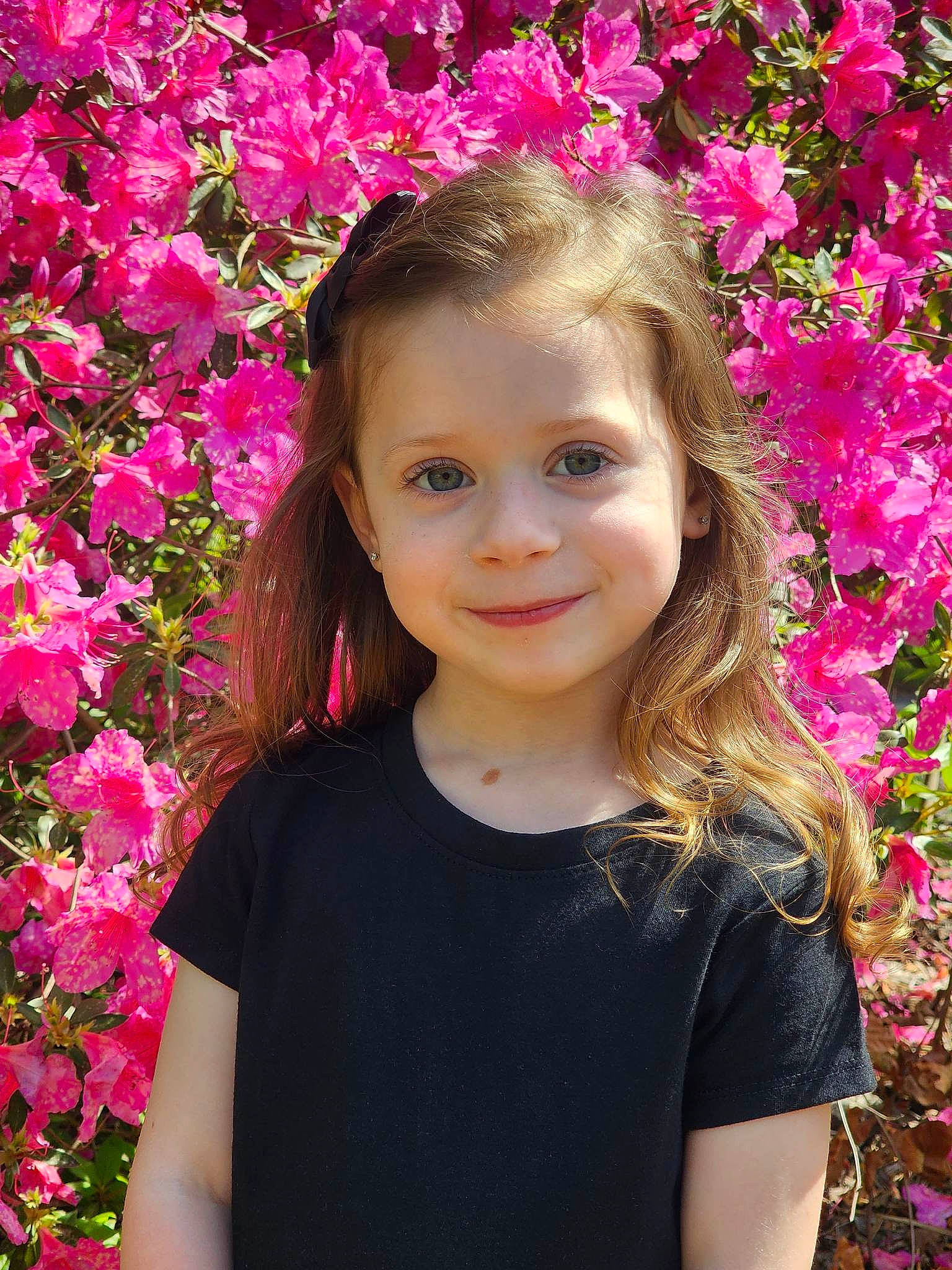 Reagan joined the competition — help win amazing prizes! botany, chin, eye, face, facial_expression, flower, grass, hair, happy, head, iris, joy, leaf, lip, nature, organ, people_in_nature, person, petal, plant