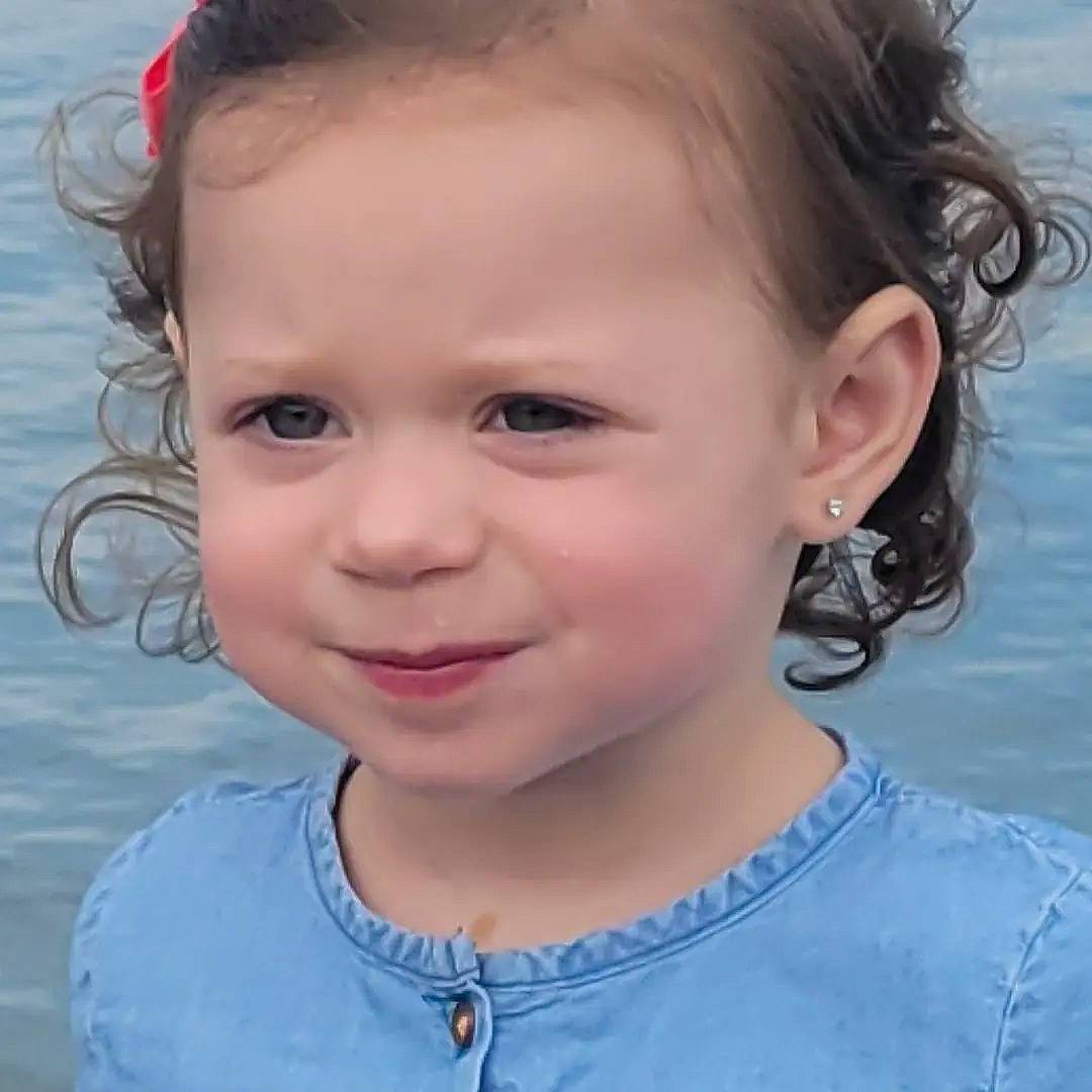 Reagan is registered to the contest to win money with this photo: azure, cheek, chin, cool, ear, electric_blue, eye, eyebrow, eyelash, facial_expression, happy, iris, jaw, joy, lip, nose, person, skin, smile, summer