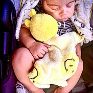 Erick is registered to the contest to win money with this photo: baby, sleeping, plush_toy, blanket, infant, cozy, peaceful, child, cute, hand, feet, car_seat, soft, nap, adorable, resting, toddler, comfort, warm, relaxed