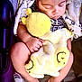 baby, sleeping, plush_toy, blanket, infant, cozy, peaceful, child, cute, hand, feet, car_seat, soft, nap, adorable, resting, toddler, comfort, warm, relaxed