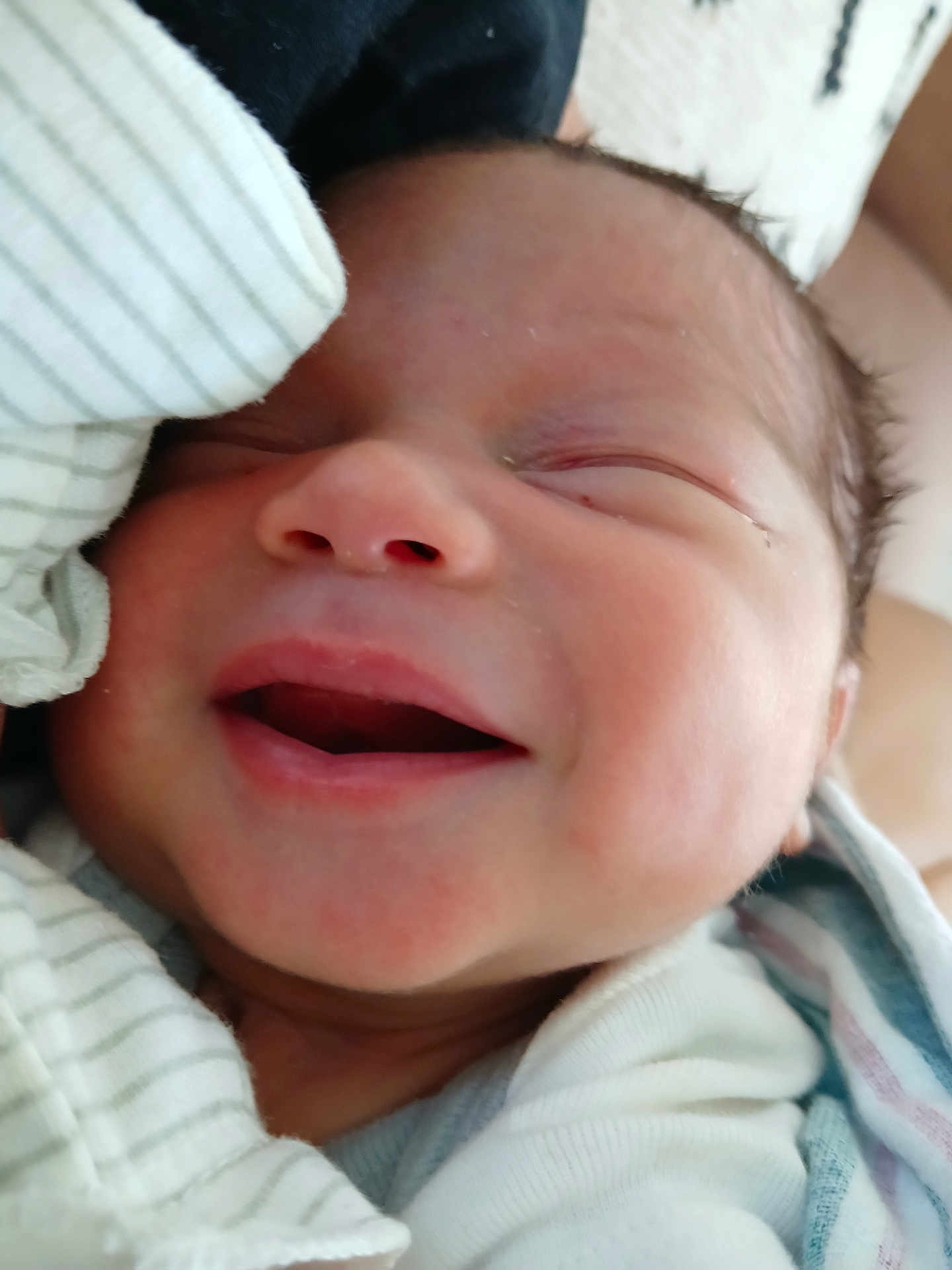 Erick joined the competition — help win amazing prizes! newborn, baby, infant, smiling, face, closeup, sleeping, wrapped, blanket, soft, cute, skin, peaceful, child, portrait, newborn_baby, tiny, adorable, human, baby_clothes