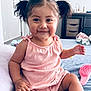 bed, child, cozy, cute, dresser, face, foot, furniture, hair, hand, happy, indoor, person, pigtails, pink_outfit, room, skin, smiling, toddler, toy